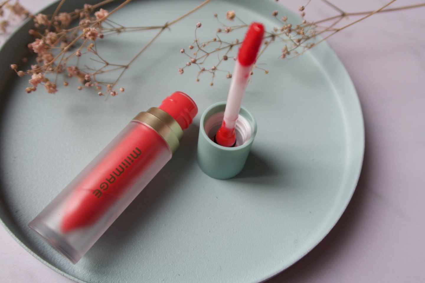 Milimage Water Rising Tint in "Peach Punch Red".  #milimage #waterrisingtint #koreanmakeup #koreanlipstick 